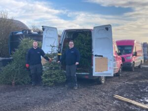 Phil & Sean delivering the old Christmas trees at the Recycling Centre in Bramcote